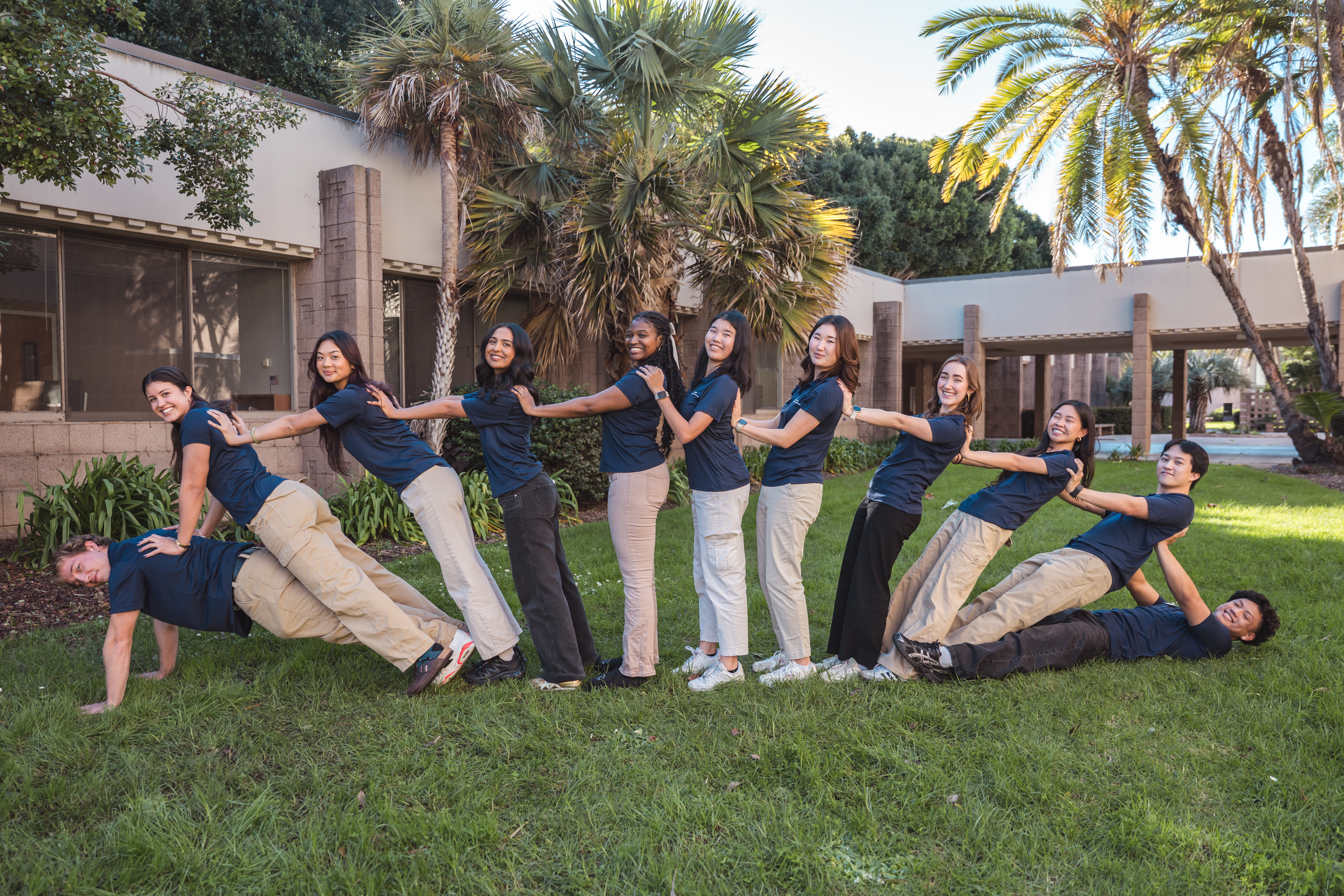 Group of Athletic Training staff in a line.