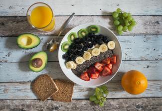 Healthy Breakfast with Fruits, Orange Juice, and Toast